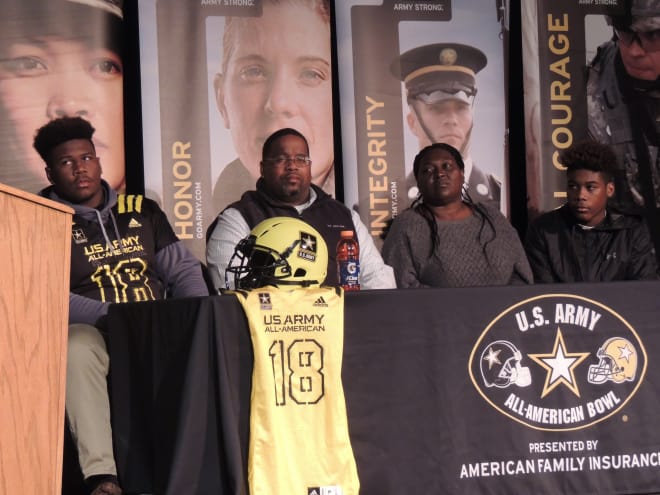 Raleigh Sanderson High senior defensive lineman Alim McNeill was able to celebrate with his family in getting selected for the U.S. Army All-American Bowl.