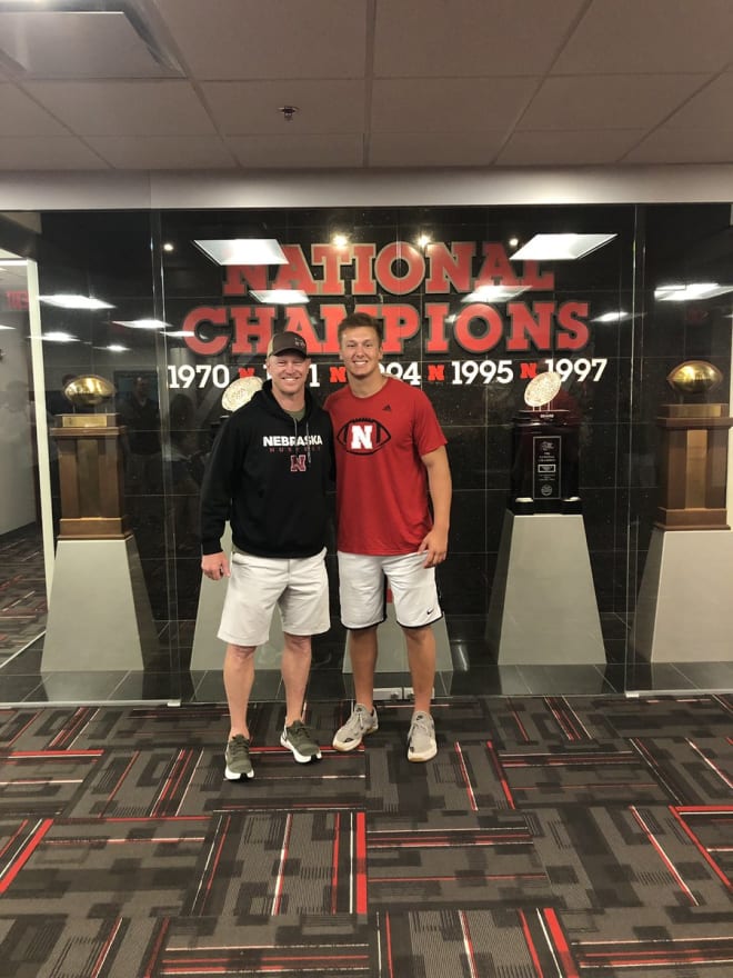 NU head coach Scott Frost with Blaise Gunnerson.