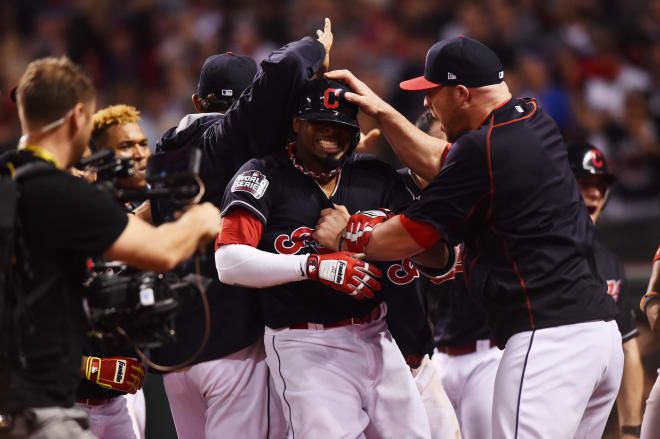 Cleveland Indians outfielder Rajai Davis celebrates with teammates after hitting a game-tying two-run home run in the eighth inning of Game 7 of the World Series Wednesday. The Indians lost Game 7 to the Chicago Cubs, 8-7, in 10 innings.