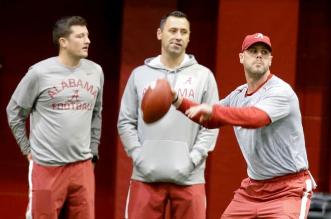The Crimson Tide began practice for the first round of the playoffs Friday, December 16, 2016. New offensive coordinator Steve Sarkisian, center, watches the practice.