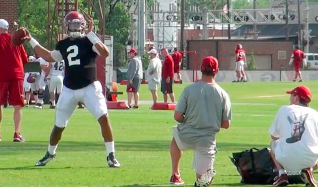 Quarterback Jalen Hurts throws a pass during Tuesday's practice 