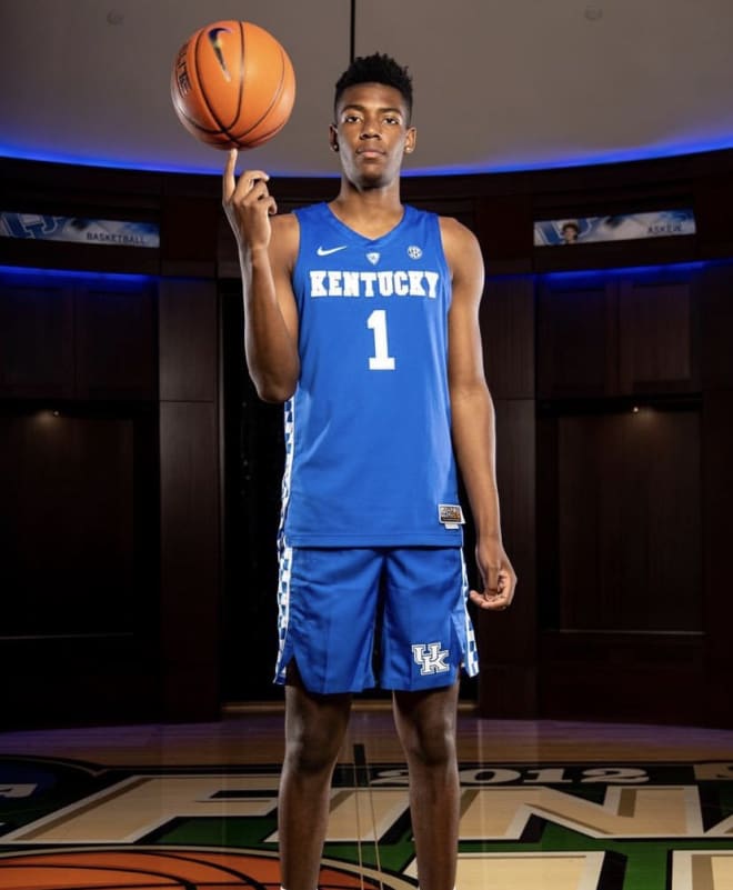 Brandon Miller poses during his official visit 