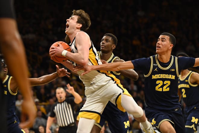 Patrick McCaffery drives to the hoop in Iowa's loss to Michigan.