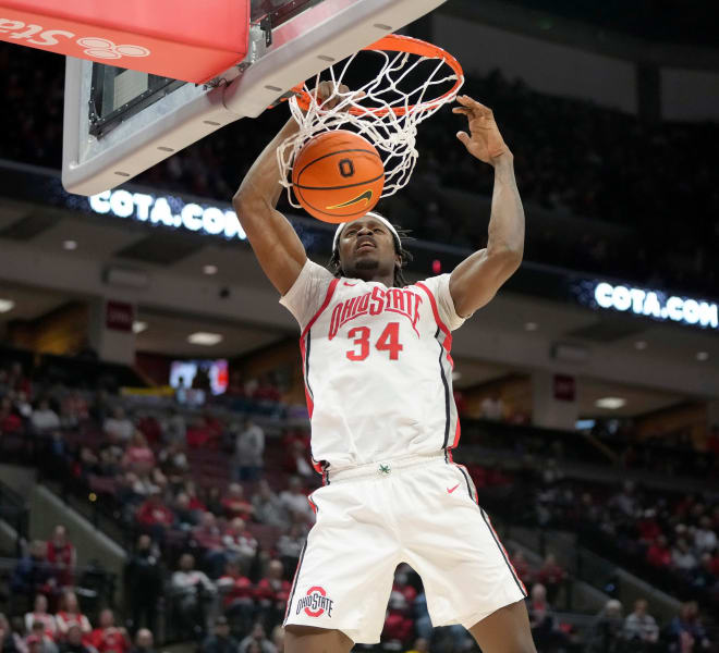 Feb. 10, 2024; Columbus, Ohio, USA; Ohio State Buckeyes center Felix Okpara (34) dunks during the second half of a Division I NCAA basketball game against the Maryland Terrapins at Value City Arena.