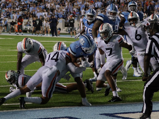 Caleb Hood (4) was UNC's third running back last season until an injury four games into the campaign.