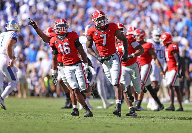 Quay Walker and Lewis Cine celebrate after a defensive play in Saturday's win over Kentucky. (Tony Walsh/UGA Sports Communications)