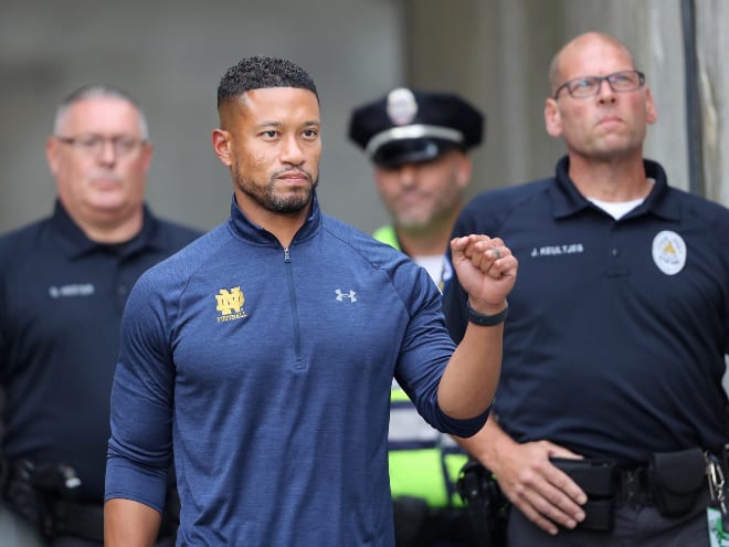 Marcus Freeman, front, is still looking for his first win as Notre Dame's head football coach.