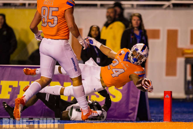 Boise State running back, George Holani dives for the endzone for a touchdown Saturday night against Hawaii. The Broncos defeated the Rainbow Warriors 59-37.