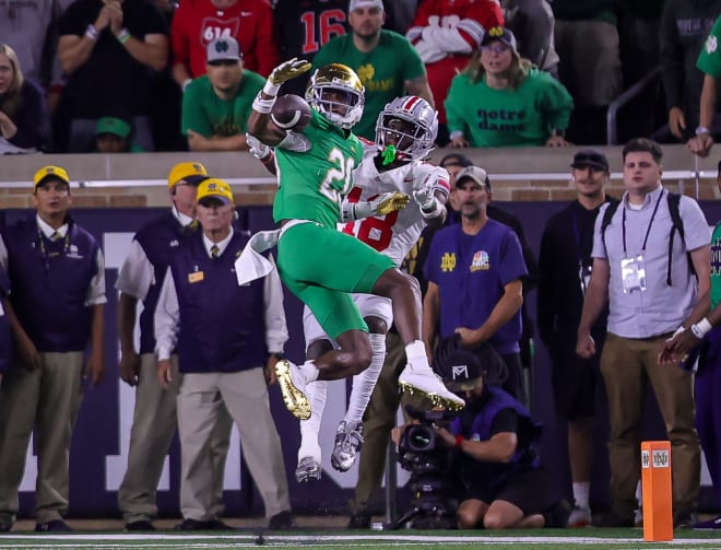 Notre Dame cornerback Benjamin Morrison defends against Ohio State wide receiver Marvin Harrison Jr., last September at Notre Dame Stadium.