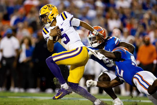 LSU quarterback Jayden Daniels threw for three TDs and ran for three TDs in the Tigers' 45-35 SEC road win at Florida on Saturday night.