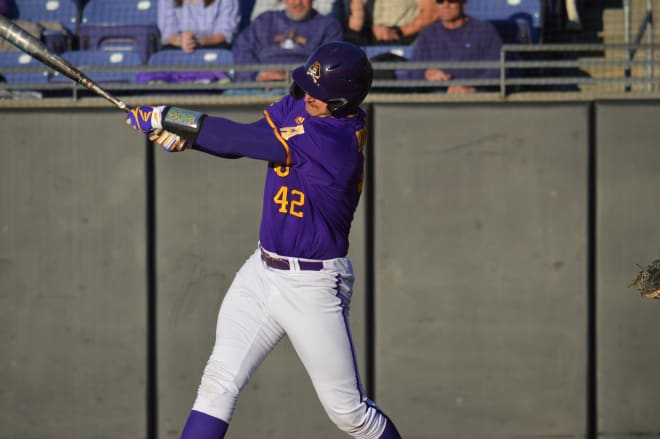 Spencer Brickhouse pounds a three-run homer in the eighth inning to help secure a 7-4 series win over UCF.