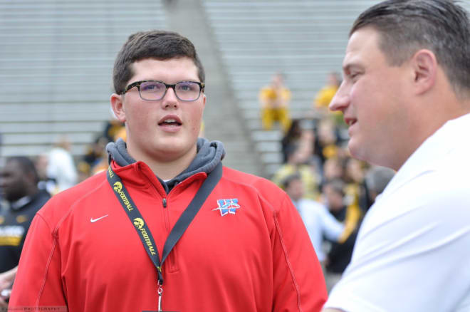 Class of 2018 OL Andrew Todd talks to Brian Ferentz during his visit to Iowa this month.
