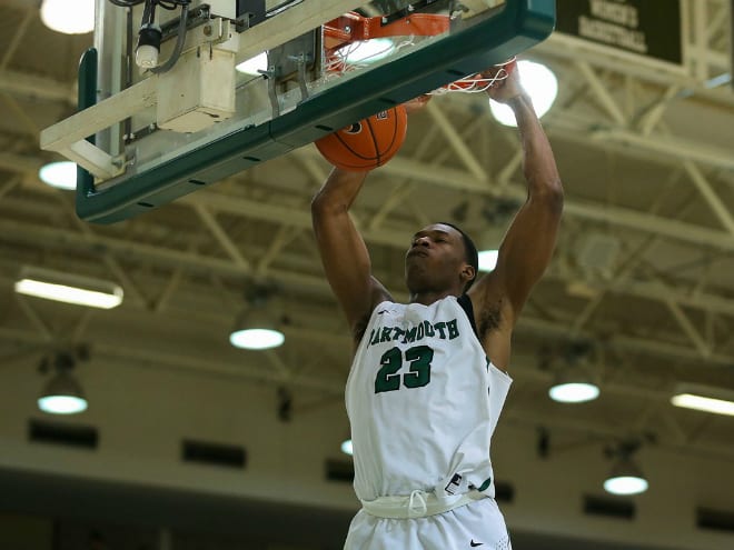Dartmouth Big Green center Chris Knight finishes a dunk during a game in Leede Arena