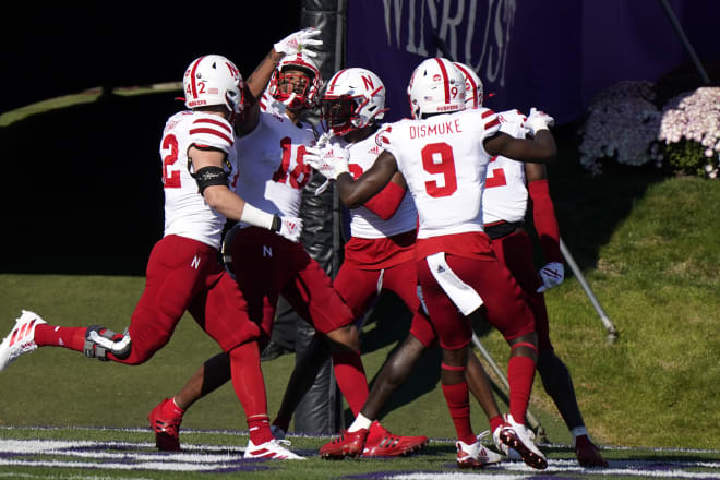 Myles Farmer (18) and Nebraska's defense.