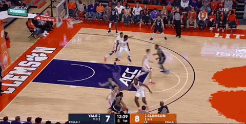 Paul Atkinson's pass helps create an open shot for Yale's best shooter, which he misses