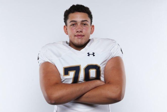 Arizona offensive lineman Tosh Baker is committed to Notre Dame. 