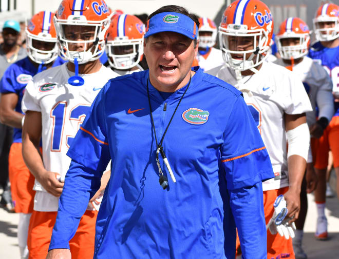 Dan Mullen on his way to his first practice as the head coach of the Florida Gators