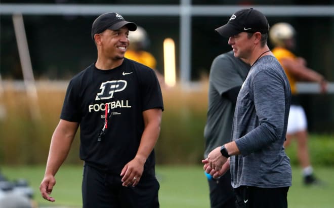 Purdue Boilermakers head coach Ryan Walters talks to Purdue Boilermakers defensive coordinator Kevin Kane Wednesday, July 31, 2024, during Purdue football practice at Bimel Outdoor Practice Complex in West Lafayette, Ind. © Alex Martin/Journal and Courier / USA TODAY NETWORK