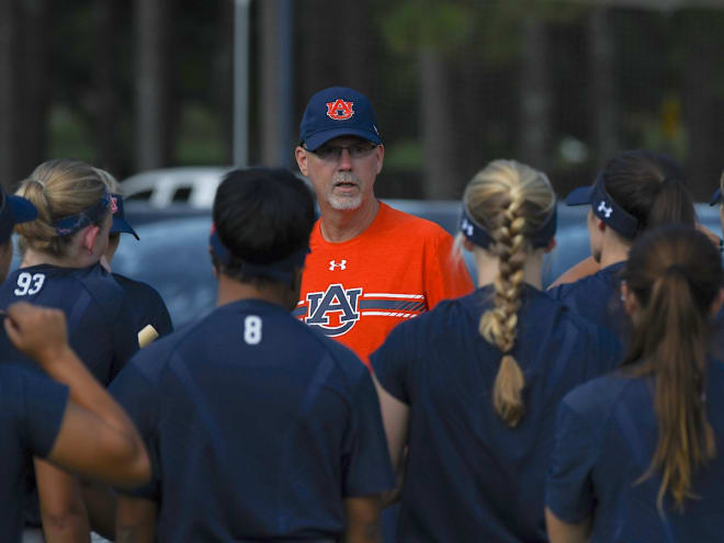 Dean speaks to his new team during Wednesday's first fall practice.