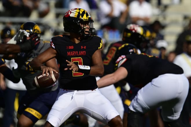 Taulia Tagovailoa leads the Maryland offense against Iowa on Friday night.