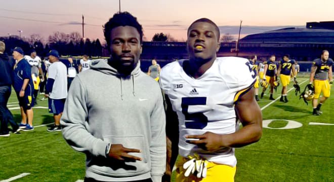 Eno Benjamin and Jabrill Peppers after a spring practice