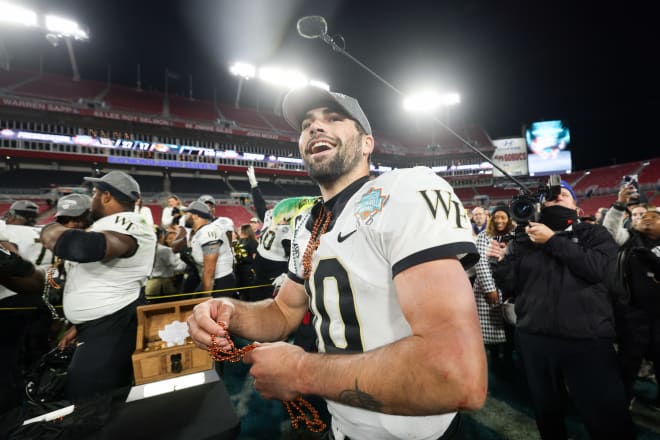 Wake Forest QB Sam Hartman celebrates a Gasparilla Bow victory Friday night in Tampa, Fla,