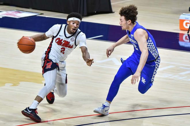 Ole Miss Rebels guard Devontae Shuler (2) handles the ball against Kentucky Wildcats guard Devin Askew (2) during the second half at The Pavilion at Ole Miss. Mandatory Credit: Justin Ford-USA TODAY Sports