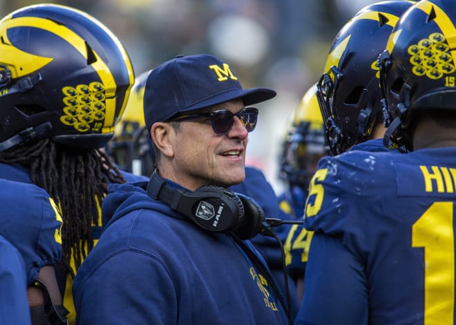 Michigan Wolverines head football coach Jim Harbaugh has won 49 games at U-M. 