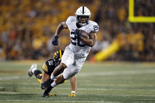 Saquon Barkley helped Penn State sneak past Iowa with 358 total yards.