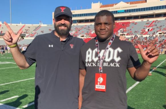 Spring LB Elijah Fields with Tech Director of Player Personnel Preston Pehrson