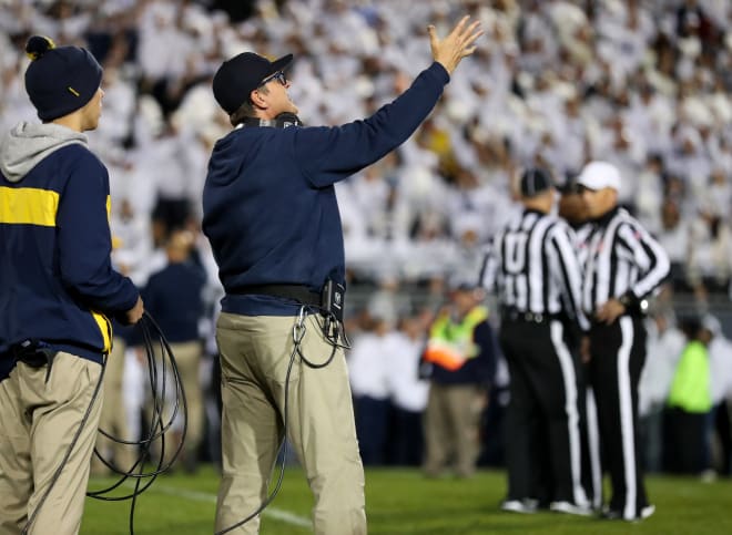 Jim Harbaugh appears to appeal to the heavens for help that never arrived in Beaver Stadium.