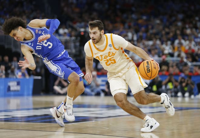 Mar 18, 2023; Orlando, FL, USA; Tennessee Volunteers guard Santiago Vescovi (25) gets around Duke Blue Devils guard Tyrese Proctor (5) during the first half in the second round of the 2023 NCAA Tournament at Legacy Arena. Mandatory Credit: Russell Lansford-USA TODAY Sports