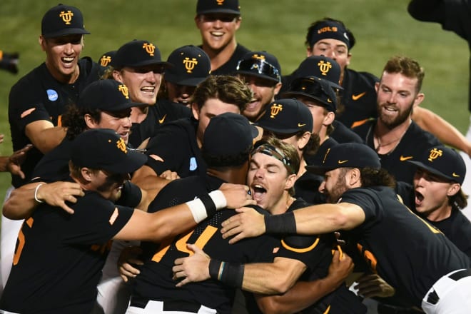 Tennessee's Cal Stark (10) and Marcus Phillips (44) celebrate their win over Evansville in the Knoxville Super Regional of the NCAA baseball tournament on Sunday, June 9, 2024 in Knoxville, Tenn.