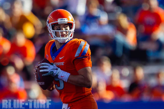Boise State QB, Hank Bachmeier (19) drops back to pass during first half action with Nevada.