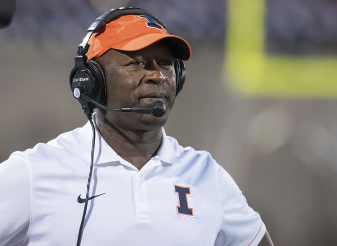  Illinois coach Lovie Smith watches from the sideline during the team's NCAA college football game against North Carolina in Champaign, Ill.