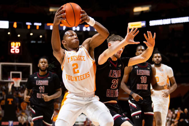 Tennessee guard Jordan Gainey (2) attempts a shot past Lenoir-Rhyne guard Hamilton Campbell (22) during a game between Tennessee and Lenoir-Rhyne at Food City Center at Thompson-Boling Arena in Knoxville on Tuesday, Oct. 31, 2023.