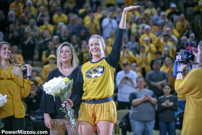 Sophie Cunningham waves to the crowd alongside her mother, Paula, as she's honored before Missouri's game against Alabama.