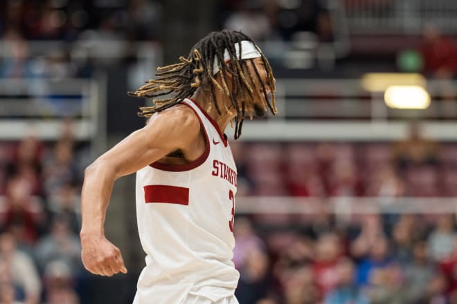 Kanaan Carlyle pumped up after making a big shot against Arizona. 