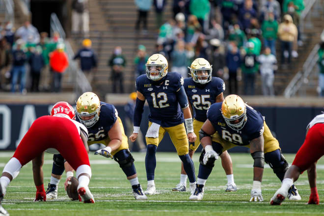 Ian Book and the Notre Dame scuffled against Louisville but did enough to win.