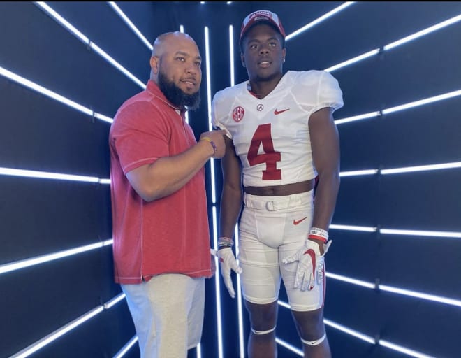 Rueben Owens (right) with Alabama runnings backs coach Robert Gillespie