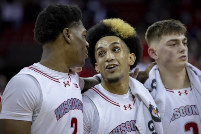 Chucky Hepburn shares a laugh with A.J. Storr following Wisconsin's 81-66 win over Michigan State on Jan.26 