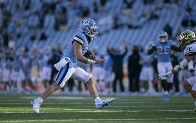 Howell had a record-setting day passing the ball but also beat Wake with his legs.