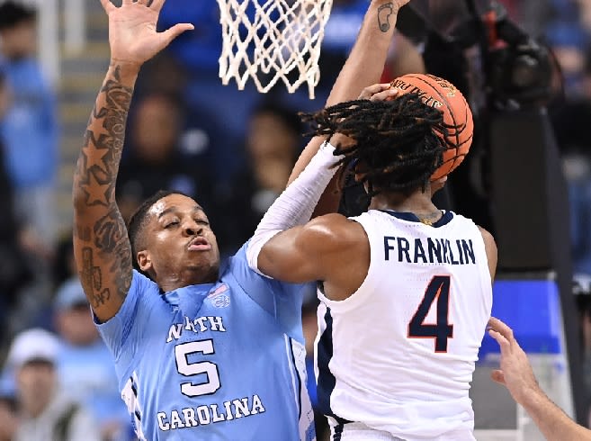 UNC forward Armando Bacot tried battling through an ankle injury, but afetr a while, couldn't go any longer.