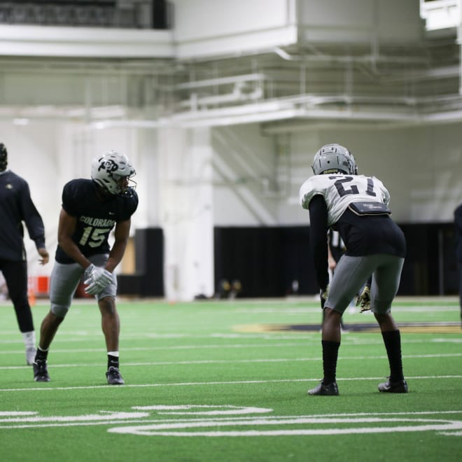 Freshman wideout Montana Lemonious-Craig is defended by sophomore cornerback Nigel Bethel during Friday's scrimmage