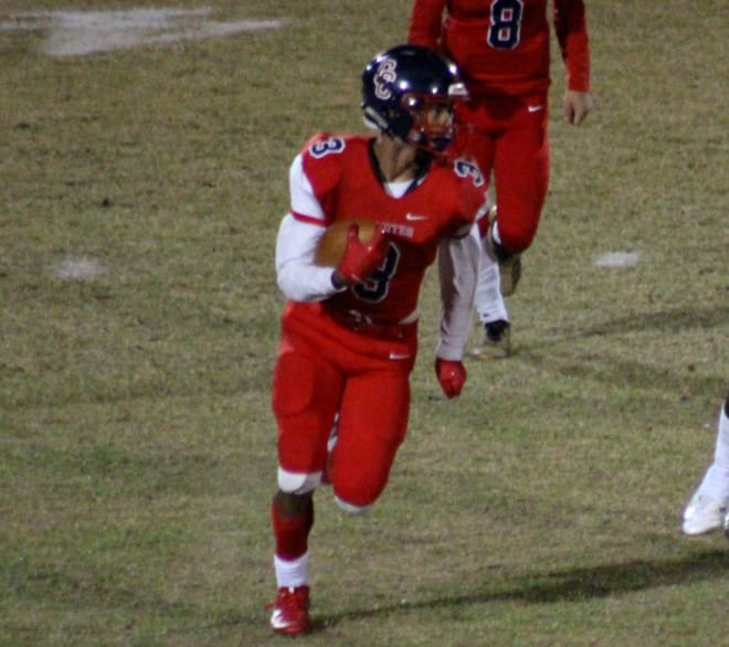 Coyote running back Jaiden Young carries the ball during one of the team's home games this season.