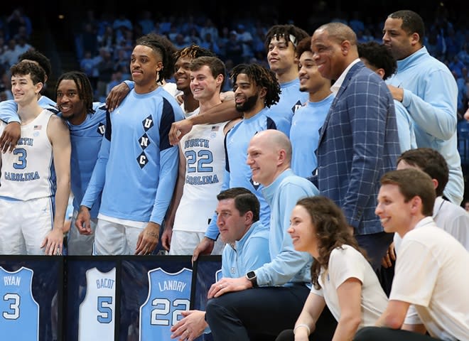 UNC guard RJ Davis (middle) took part in Senior Night on Tuesday, but could return for a fifth season.