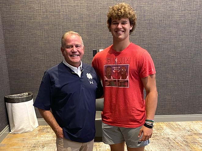 Notre Dame Fighting Irish football head coach Brain Kelly with recruiting target Luke Montgomery