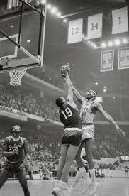 Reggie Harding going head-up with WIlt Chamberlain.