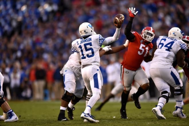 Along with head coach Mark Stoops, Kentucky's offensive coordinator, and a few other Wildcat players, visiting quarterback STEPHEN JOHNSON (No. 15) discussed their loss to Georgia.