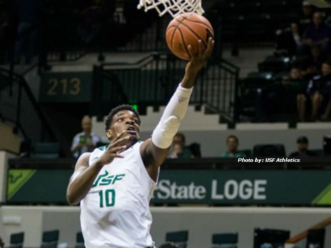 USF Bulls forward Alexis Yetna attempts a layup during the first half of a game at Yuengling Center.